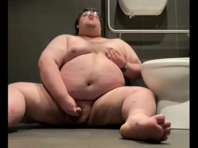 Chubby plays in public bathroom